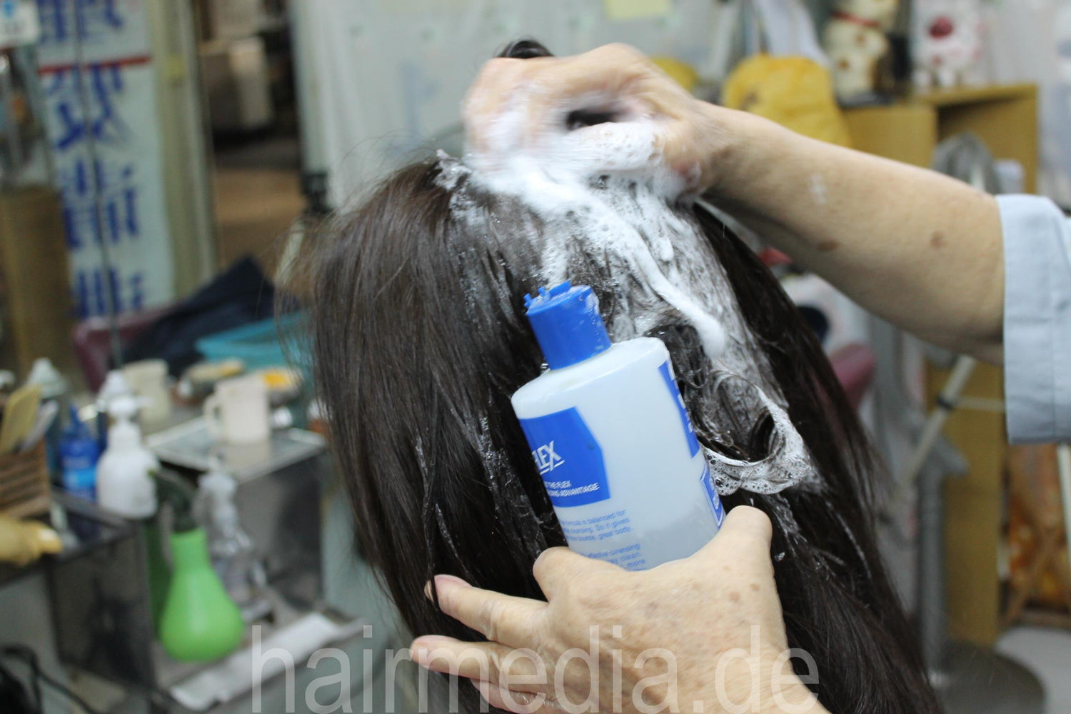 shampoo into dry hair