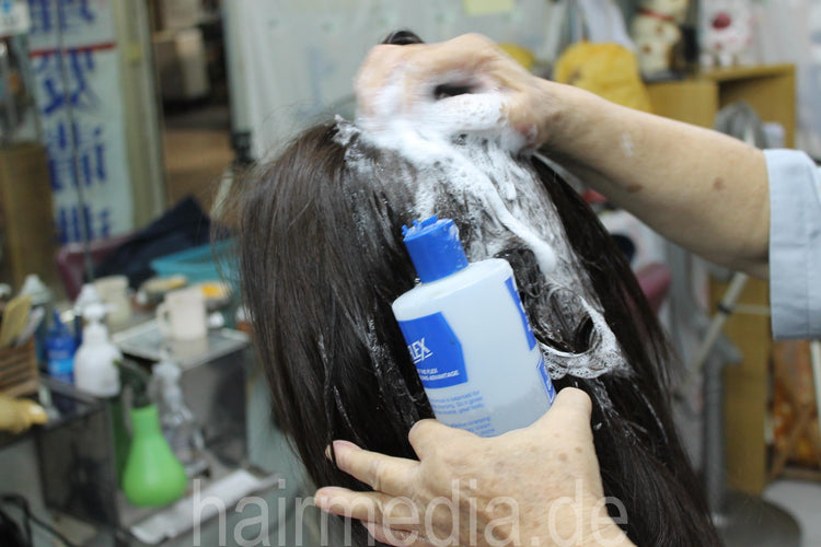 shampoo into dry hair