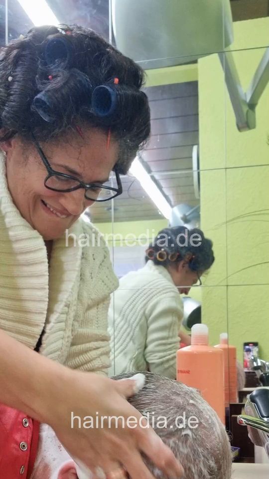 1240 MariaGi barberette in rollers doing male client - frontcam
