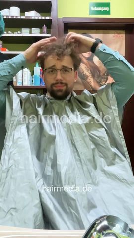 Josh by Jamilla student barberette in rollers, forward shampoo and hooddryer