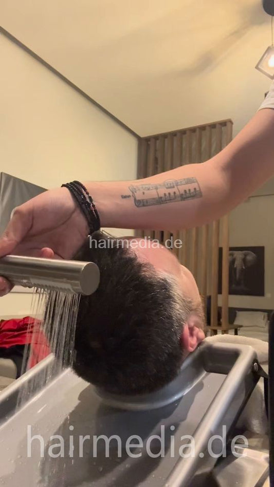2032 Nikos Barber 250415 Ginannis backward twice shampooing using headmassager