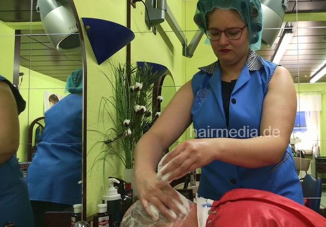 Barberette AnjaB XXL hair in rollers doing male client forward wash