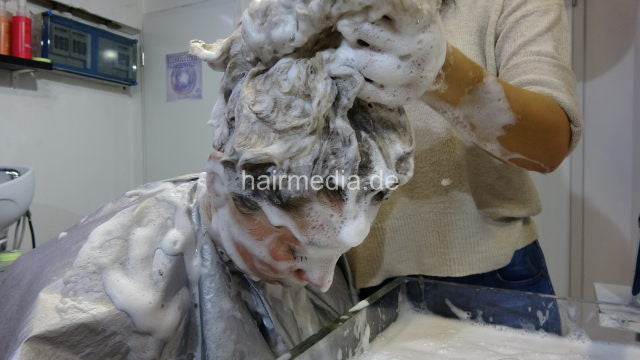 2602 Sari in red skirt highheels head and face upright and forward wash by Melody in jeans and pullover