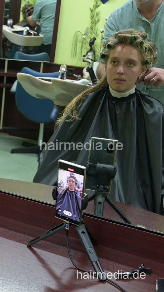 2306 LinaW by salonbarber 2  wetset thick hair smoking in rollers - vertical video