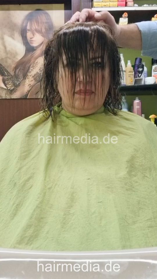 1252 Mahshids mom 2 haircut by barber  vertical video
