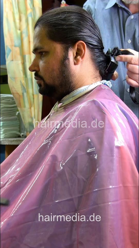 2304 Nasir 4 ponytail chop and buzz and beard with Osterclippers -vertical video