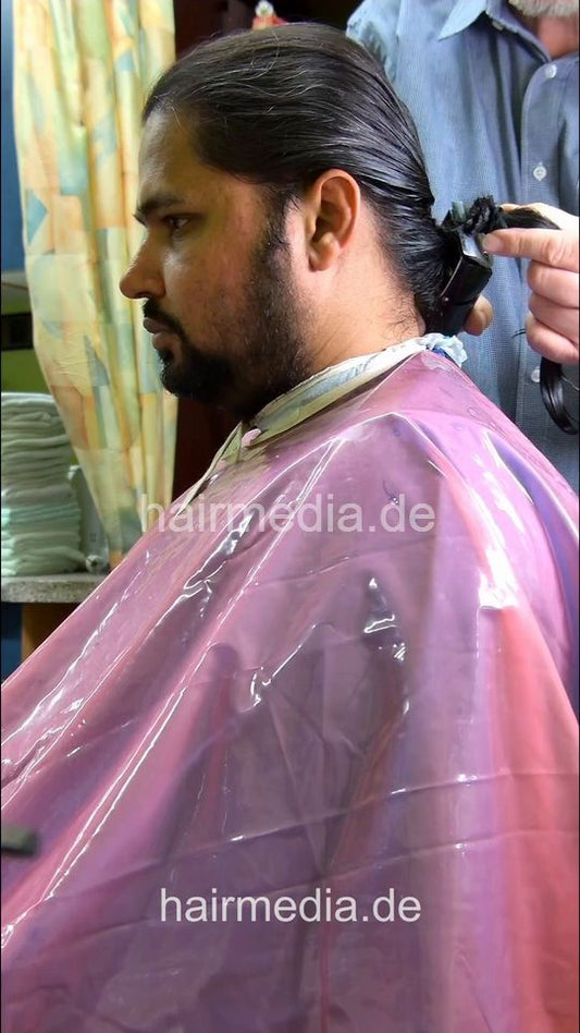 2304 Nasir 4 ponytail chop and buzz and beard with Osterclippers -vertical video