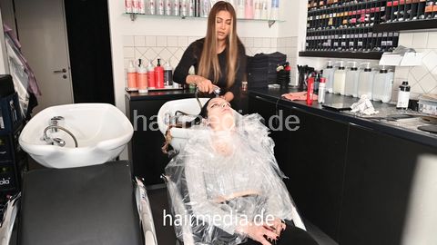 NatalieK shampoo and blow by Zoya in large shiny cape