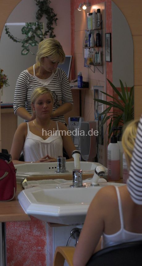 656 Julia teen shampooing forward in GDR salon hairwash
