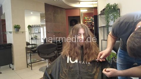 Haircut in Vilnius - thick permed hair by barber