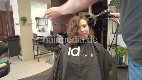 Haircut in Vilnius - thick permed hair by barber