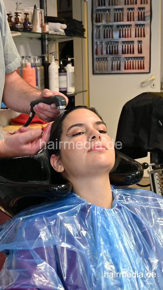 1188 04 AlinaR backward shampooing and conditioner by barber vertical video