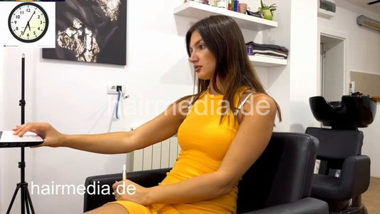 1155 Neda Salon 20220630 a lone in a row, barberette self shampooing forward yellow dress