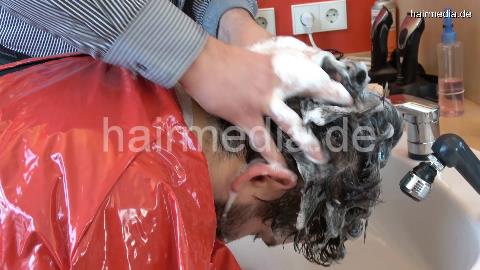 2021 Felix in leatherpants strong forwardwash hair ear and beard by barber in heavy red pvc cape
