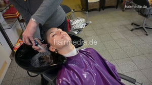 1176 Geraldine 1 backward salon black bowl shampoo in knitwear and pvc shampoocape