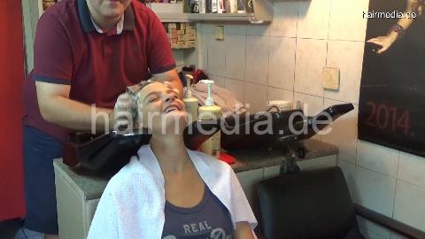 6196 SarahB 1 teen backward salon shampooing by barber in short pants