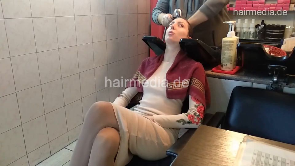6207 Jana 1 backward salon shampooing hair and ear by barber CAM 2