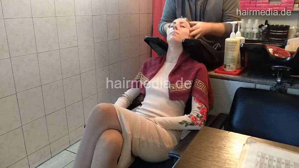 6207 Jana 1 backward salon shampooing hair and ear by barber CAM 2