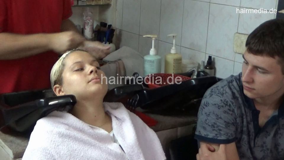 6212 TamaraL 1 teen backward hair face and ear wash by barber, boyfriend watching