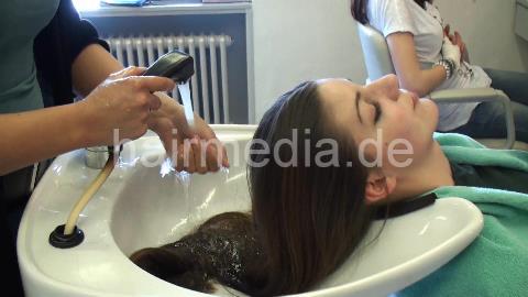 8043 2 shampooing teen long hair in green towel shampoobowl backward