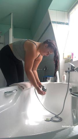 9000 AmeliaS curvy redhead self shampooing forward over tub at home