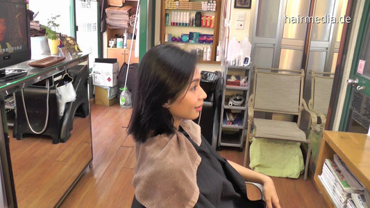 359 Ayu shampooing backward by barber