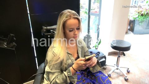 381 Sophie in black salon backward shampooing and haircut by barber