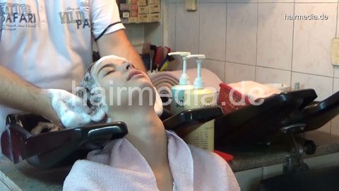 6196 06 Tina hair ear shampooing by barber salon backward shampoostation