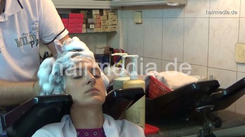6196 08 Tammy hair and ear shampooing by barber