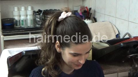 6207 05 NinaK backward salon shampooing hair ear and face by barber