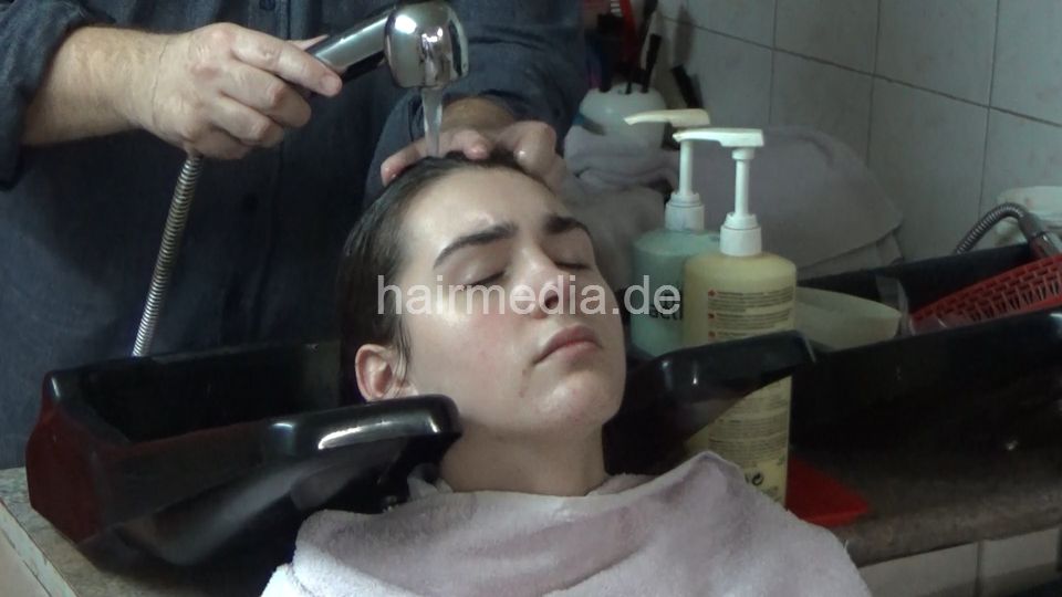 6207 09 VanjaD backward salon shampooing hair ear and face by barber
