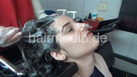 6207 05 NinaK backward salon shampooing hair ear and face by barber