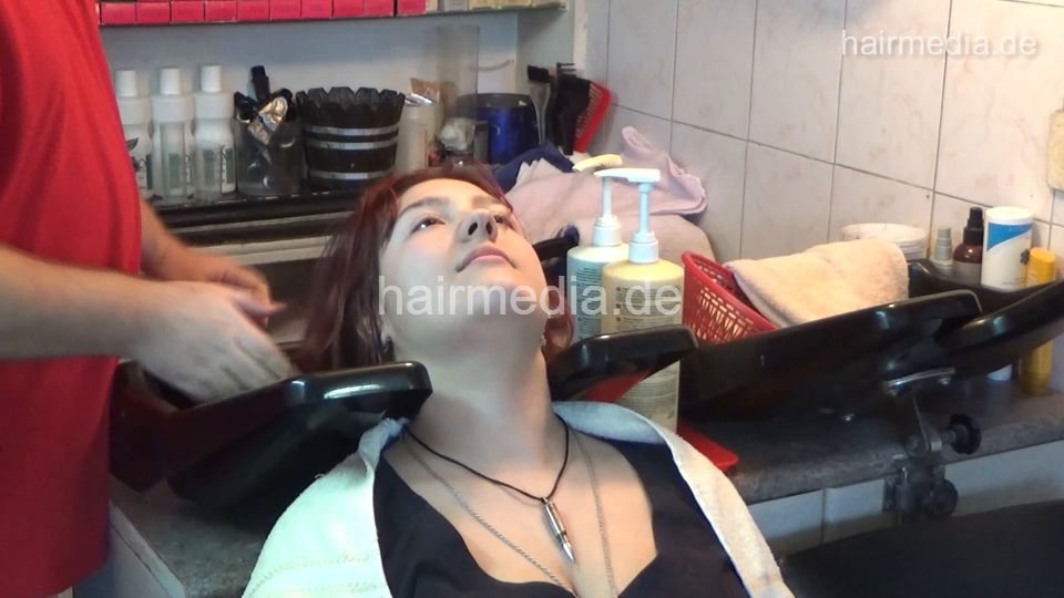 6207 young girls Chris broken jeans 1 backward salon shampooing hair and ear by barber wash