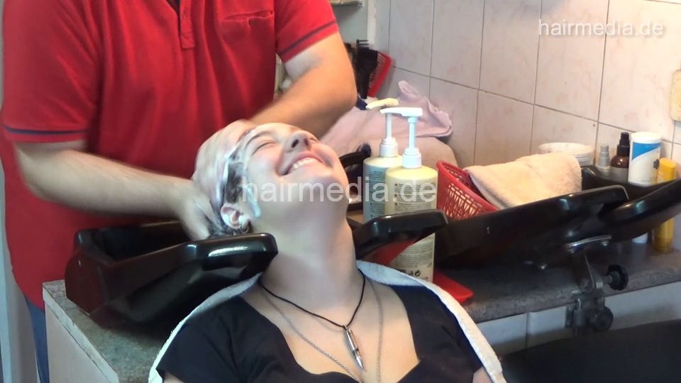 6207 young girls Chris broken jeans 1 backward salon shampooing hair and ear by barber wash