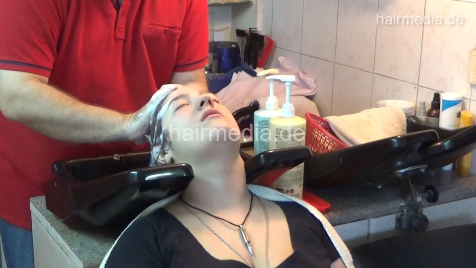6207 young girls Chris broken jeans 1 backward salon shampooing hair and ear by barber wash