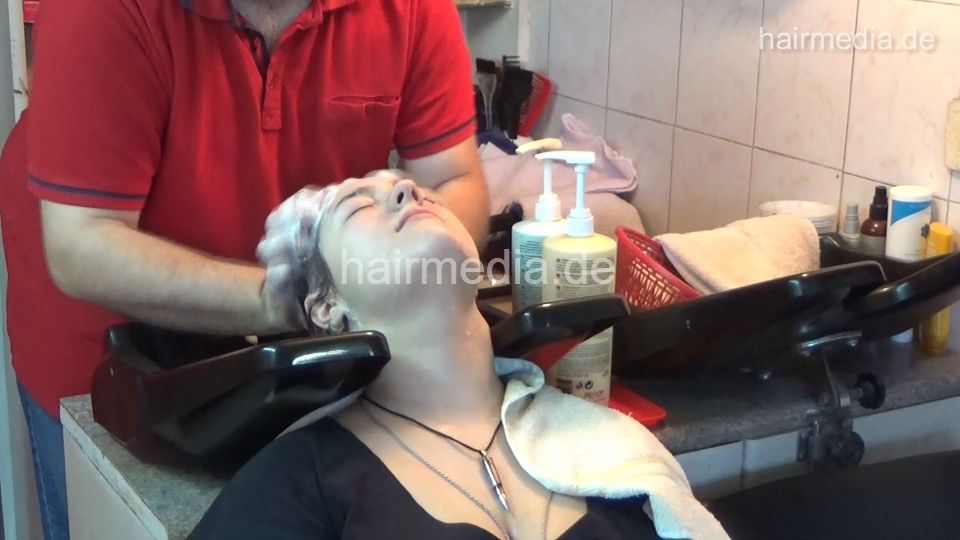 6207 young girls Chris broken jeans 1 backward salon shampooing hair and ear by barber wash