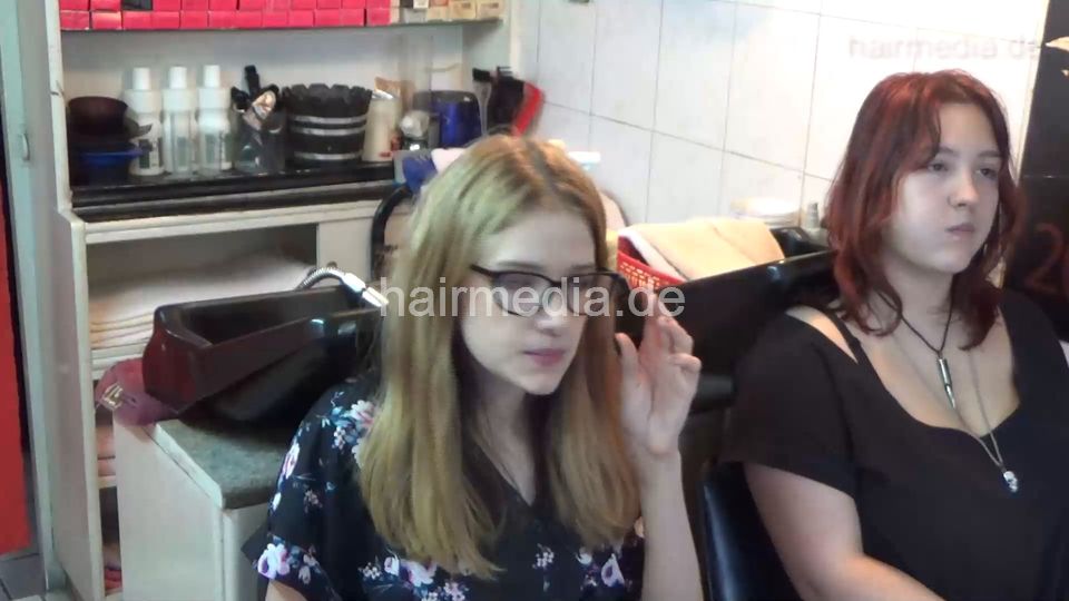 6207 young girls Mia 1 backward salon shampooing hair by barber