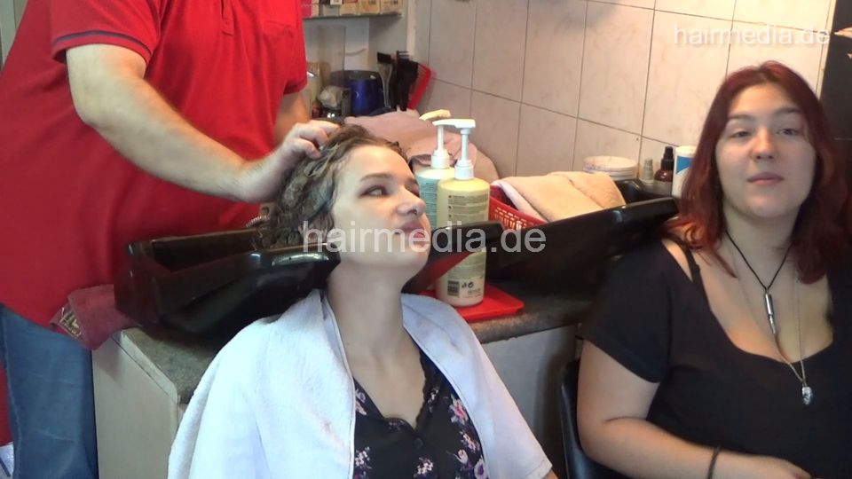 6207 young girls Mia 1 backward salon shampooing hair by barber