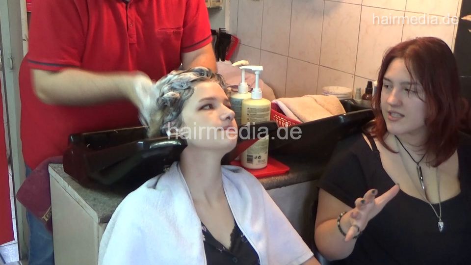 6207 young girls Mia 1 backward salon shampooing hair by barber