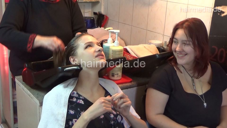 6207 young girls Mia 1 backward salon shampooing hair by barber