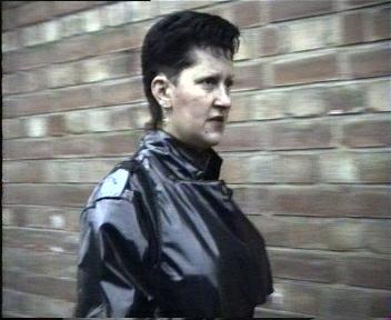 0053 UK old fashion laquer coat 1980 scene shampoo forward cut and blow in vinyl coat