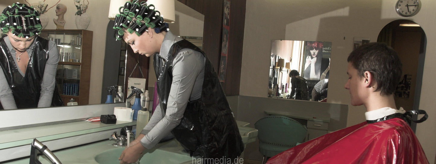 8064 Ilona 4 barberette in rollers giving Laura a forwardwash