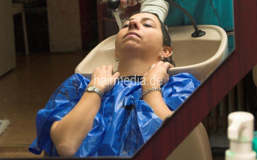 199 1 Melanie by KristinaB backward shampooing in blue pvc shampoo cape hands on bowl