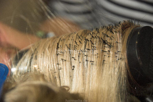 b018 Lydia style blowdry with brush blond bleached hair by master stylist