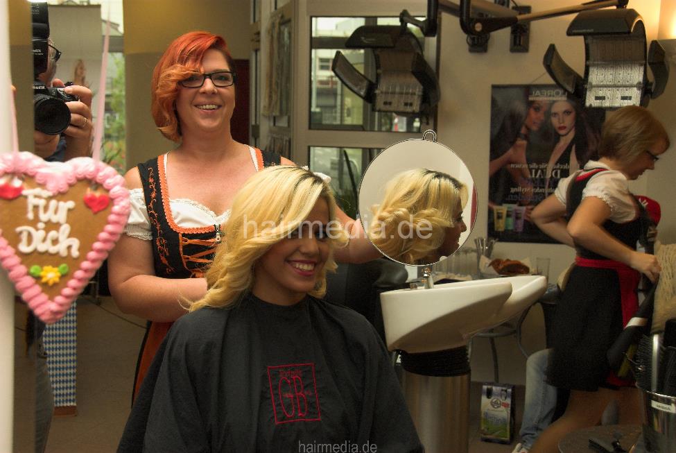 1020 2 Ernita blow dry bleached hair by bavarian dressed barberette green nails