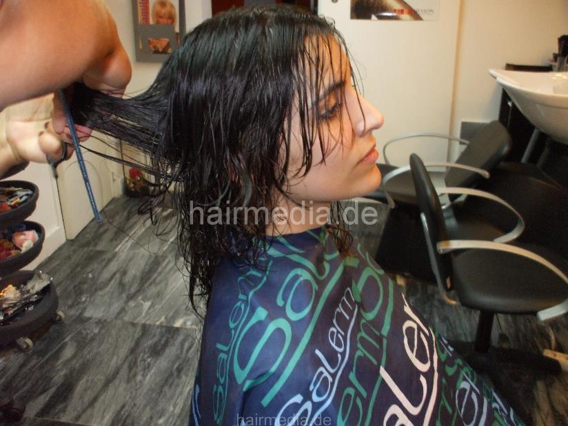 8053 Paula 2 haircut by mature barberette in white apron