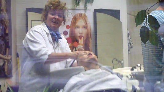 0003 mature shampooing in white apron backward manner