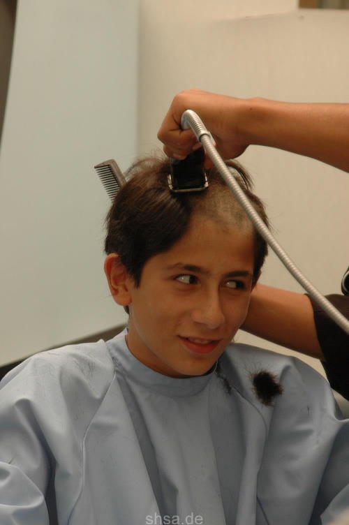 221 Berisa young boy buzz and headshave Part 1 haircut by friend