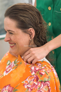 683 Iris shampooing forwardwash in green bowl by green apron barberette LauraB