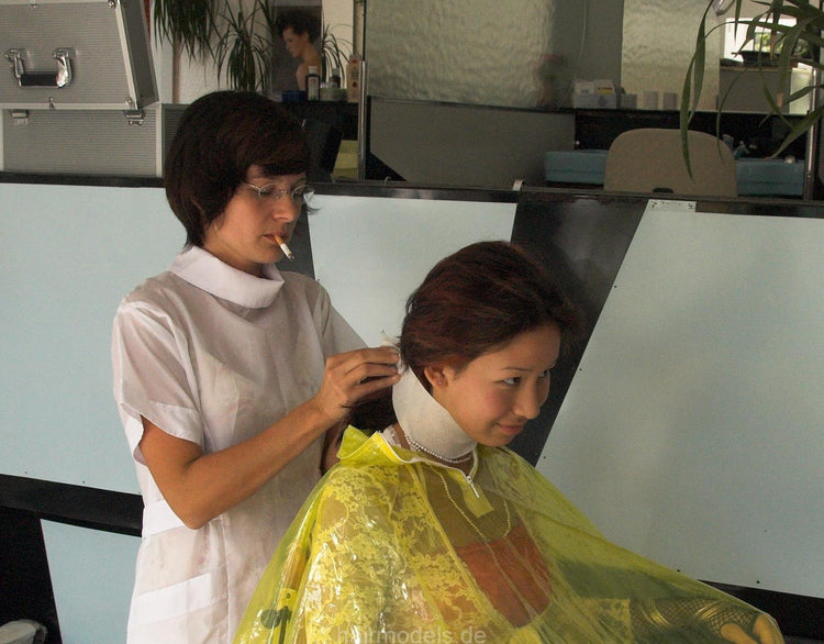 766 asian girl vinyl raincoat perm